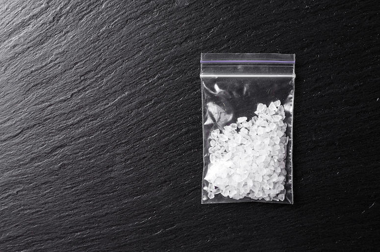 Drugs, Meth, Crystal Meth, Plastic Bag, Table, Black Background Drugs, Meth, Crystal Meth, Plastic Bag, Table, Black Background
