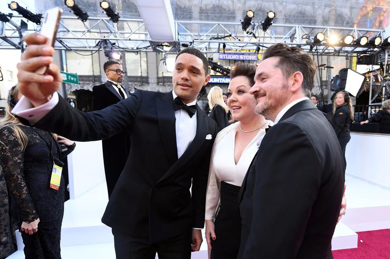 Trevor Noah, Melissa McCarthy and Ben Falcone