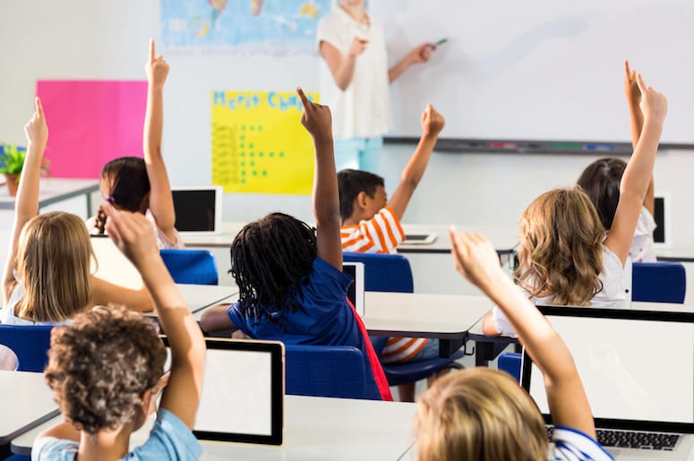 Teacher, Students, Classroom, Hands Raised Teacher, Students, Classroom, Hands Raised