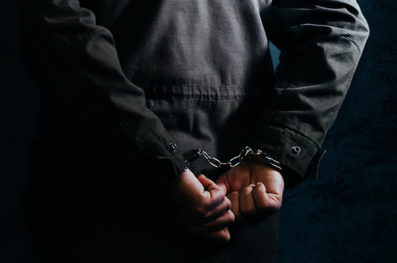 Man, Arrested, Handcuffs, Prison Wall Man, Arrested, Handcuffs, Prison Wall