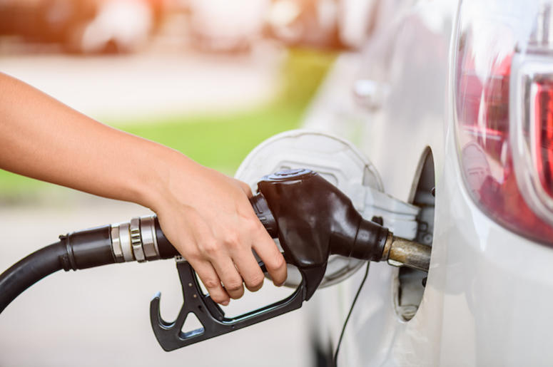 Woman, Car, Gas Station, Pumping Gas Woman, Car, Gas Station, Pumping Gas