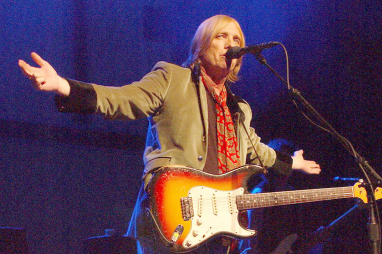 Tom Petty, Posing, Guitar, Arms Raised Tom Petty, Posing, Guitar, Arms Raised
