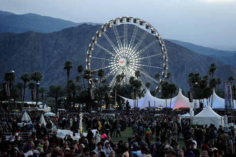Coachella Valley Music & Arts Festival INDIO, CA - APRIL 13: The ferris wheel and the coachella music crowd during Day 1 of the 2012 Coachella Valley Music & Arts Festival held at the Empire Polo Club on April 13, 2012 in Indio, California. (Photo by Frazer Harrison/Getty Images for Coachella)
