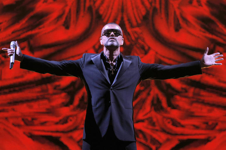 AP19039432177378 In this Sept. 9, 2012 file photo, British singer George Michael performs at a concert to raise money for the AIDS charity Sidaction, during the Symphonica tour at Palais Garnier Opera house in Paris, France. Artworks collected by George Michael before his