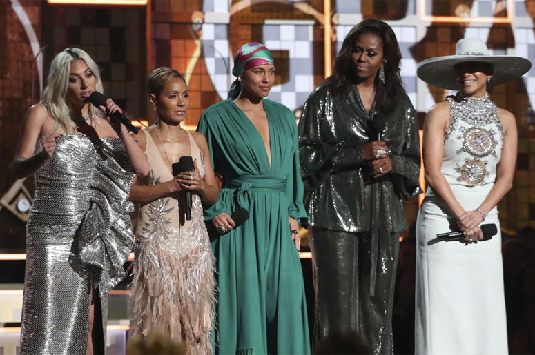 AP19042050019331 Lady Gaga, from left, Jada Pinkett Smith, Alicia Keys, Michelle Obama and Jennifer Lopez speak at the 61st annual Grammy Awards on Sunday, Feb. 10, 2019, in Los Angeles. (Photo by Matt Sayles/Invision/AP)