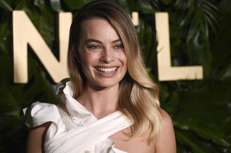 AP19256182318827 Actress Margot Robbie poses for photographers at the launch of the Gabrielle Chanel Essence fragrance at the Chateau Marmont, Thursday, Sept. 12, 2019, in Los Angeles. (Photo by Chris Pizzello/Invision/AP)