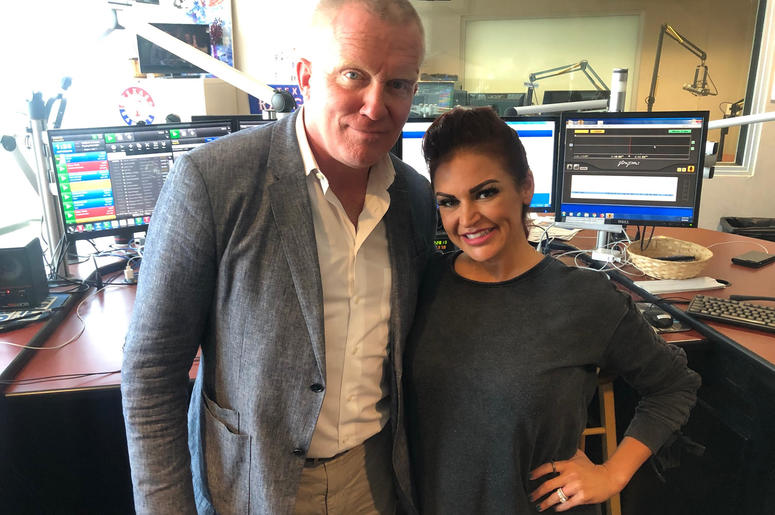 (Sybil Summers/ Entercom Radio) Anthony Michael Hall and Sybil in the 98.7 KLUV studio