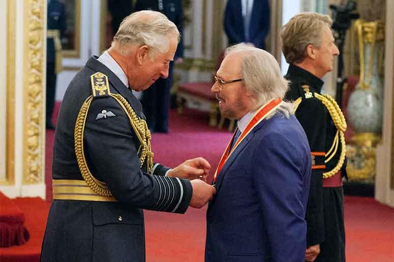 Barry Gibb talks with Prince Charles Barry Gibb talks with Prince Charles