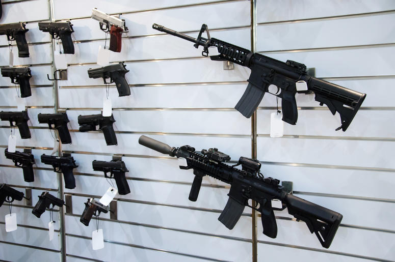 (artas/ iStock/ Getty Images Plus) Weapons on display at a gun store