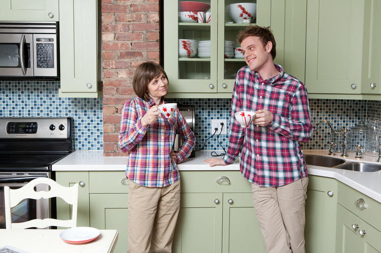 (ImageSource/ iStock/ Getty Images Plus) Mother and son wear matching plaid shirts