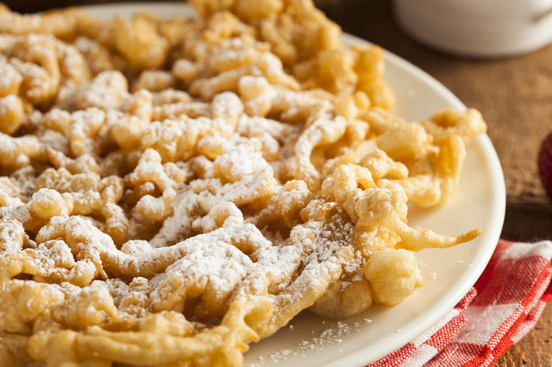 (bhofack2/ iStock/ Getty Images Plus) funnel cake at State Fair