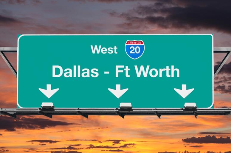 Dallas Ft Worth Interstate 20 west highway sign with sunrise sky. Dallas Ft Worth Interstate 20 west highway sign with sunrise sky.