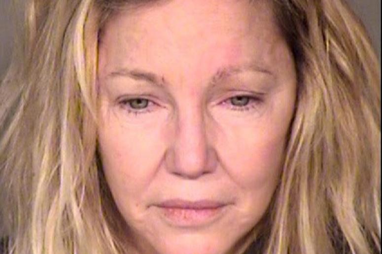 VENTURA, CA - JUNE 24: (EDITORS NOTE: Best quality available) In this handout photo provided by the Ventura County Sheriffs Office, actress Heather Locklear is seen in a police booking photo after her arrest on two counts of misdemeanor battery on a polic VENTURA, CA - JUNE 24: (EDITORS NOTE: Best quality available) In this handout photo provided by the Ventura County Sheriffs Office, actress Heather Locklear is seen in a police booking photo after her arrest on two counts of misdemeanor battery on a polic
