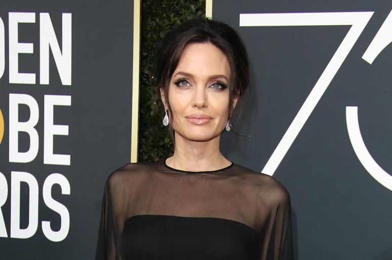 Jan 7, 2018; Beverly Hills, CA, USA; Angelina Jolie arrives for the 75th Golden Globe Awards at the Beverly Hilton. Jan 7, 2018; Beverly Hills, CA, USA; Angelina Jolie arrives for the 75th Golden Globe Awards at the Beverly Hilton.