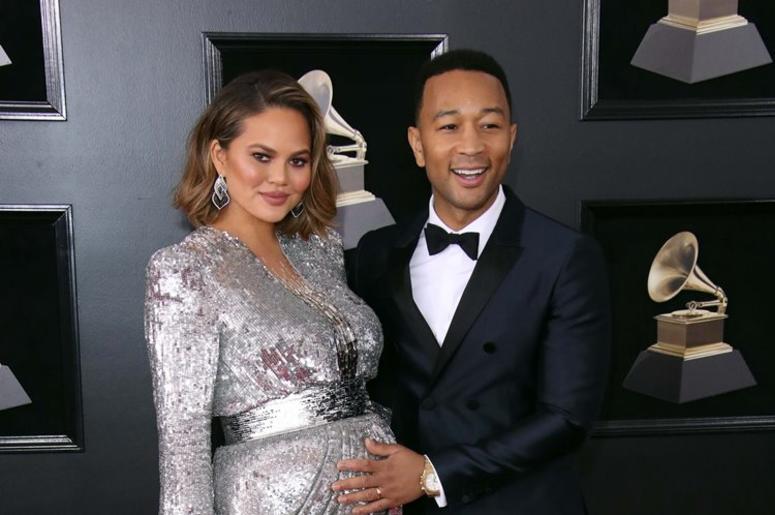 Jan 28, 2018; New York, NY, USA; Chrissy Teigen (L) and John Legend arrive at the 60th Annual Grammy Awards at Madison Square Garden Jan 28, 2018; New York, NY, USA; Chrissy Teigen (L) and John Legend arrive at the 60th Annual Grammy Awards at Madison Square Garden