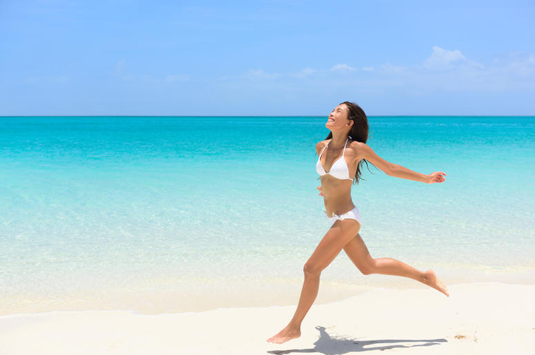 Woman Runs On The Beach beach_running