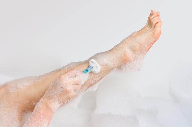 Woman Shaves Her Legs shaving_legs