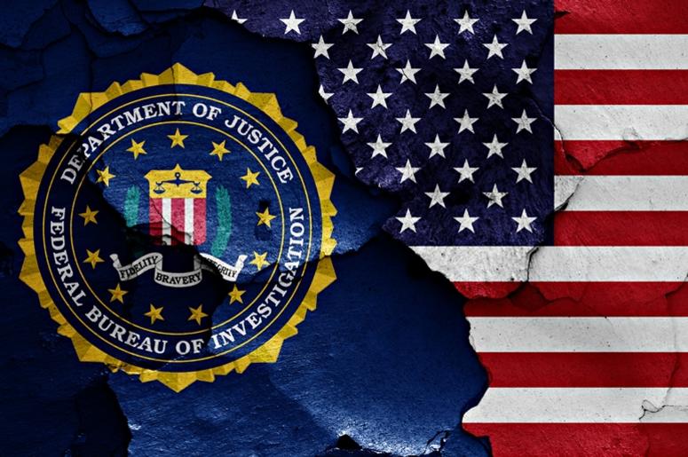 Flag of FBI and USA painted on cracked wall Flag of FBI and USA painted on cracked wall