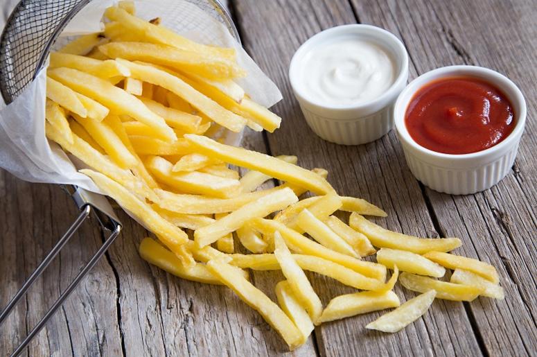 French fries with tomato ketchup and mayonnaise. Unhealthy, high. French fries with tomato ketchup and mayonnaise. Unhealthy, high.
