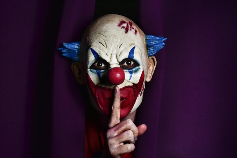 Scary evil clown asking for silence Scary evil clown asking for silence