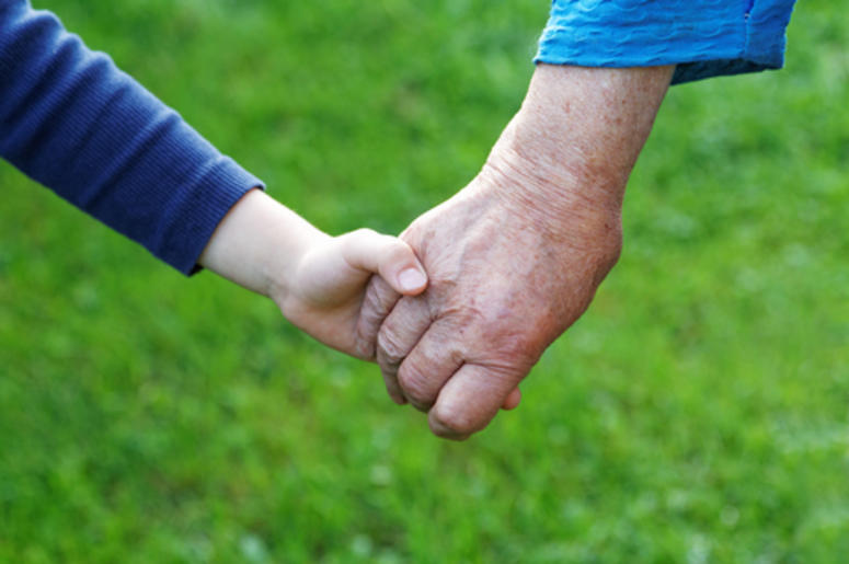 8 year old boy helps eldery lady 8 year old boy helps eldery lady