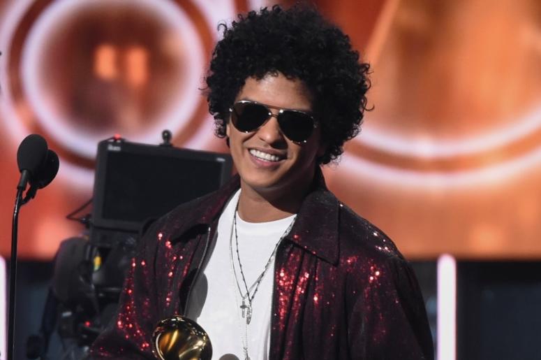 NEW YORK - JANUARY 28: Bruno Mars appears on the 60th Annual Grammy Awards at Madison Square Garden on January 28, 2018 in New York City. NEW YORK - JANUARY 28: Bruno Mars appears on the 60th Annual Grammy Awards at Madison Square Garden on January 28, 2018 in New York City.