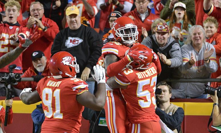Oct 21, 2018; Kansas City, MO, USA; Kansas City Chiefs free safety Ron Parker (38) celebrates with linebacker Anthony Hitchens (53) after intercepting a pass and running in for a touchdown during the second half against the Cincinnati Bengals at Arrowhead