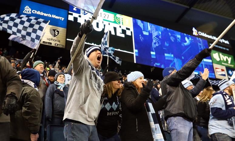 Nov 29, 2018; Kansas City, KS, USA; Sporting Kansas City fans cheer during the second half against the Portland Timbers in the second leg of the MLS Western Conference Championship at Children's Mercy Park. Credit: Jay Biggerstaff-USA TODAY Sports