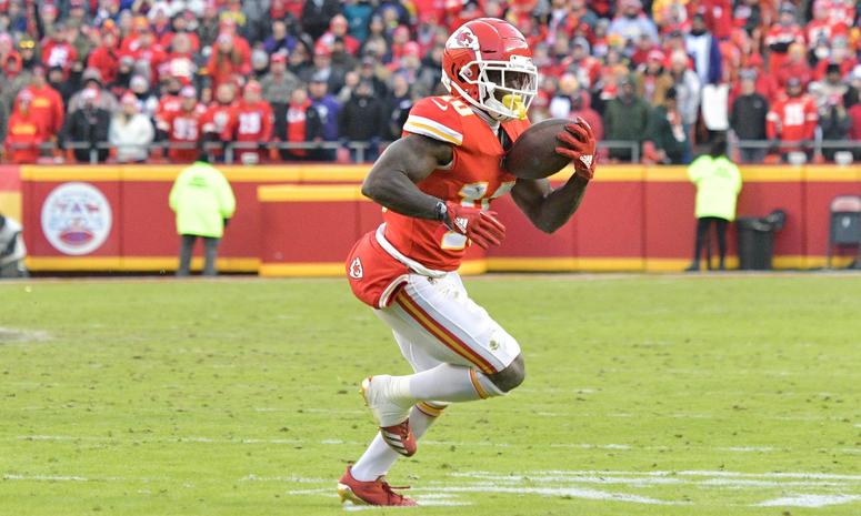 Dec 9, 2018; Kansas City, MO, USA; Kansas City Chiefs wide receiver Tyreek Hill (10) runs the ball during the second half against the Baltimore Ravens at Arrowhead Stadium. Mandatory Credit: Denny Medley-USA TODAY Sports