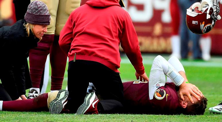 Nov 18, 2018; Landover, MD, USA; Washington Redskins quarterback Alex Smith (11) reacts after breaking his leg in the second half against the Houston Texans during the second half at FedEx Field. Credit: Brad Mills-USA TODAY Sports