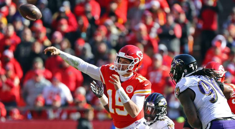 Dec 9, 2018; Kansas City, MO, USA; Kansas City Chiefs quarterback Patrick Mahomes (15) throws as he is hit by Baltimore Ravens linebacker Matthew Judon (99) in the first half at Arrowhead Stadium. Mandatory Credit: Jay Biggerstaff-USA TODAY Sports