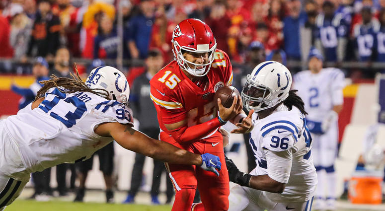 Oct 6, 2019; Kansas City, MO, USA; Kansas City Chiefs quarterback Patrick Mahomes (15) is sacked by Indianapolis Colts defensive end Jabaal Sheard (93) and defensive tackle Denico Autry (96) during the second half at Arrowhead Stadium. Mandatory Credit: J