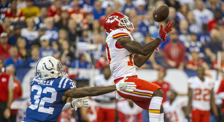 Oct 30, 2016; Indianapolis, IN, USA; Kansas City Chiefs receiver Tyreek Hill (10) goes up over Indianapolis Colts safety T.J. Green (32) to make a catch at Lucas Oil Stadium. Mandatory Credit: Thomas J. Russo-USA TODAY Sports