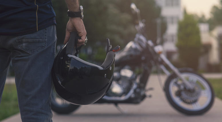motorcycle rider with helmet