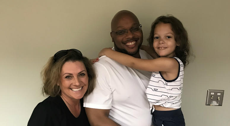 Ricky Kidd with his granddaughter and Dana Wright