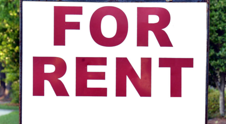 for rent For rent sign on the yard in front of a house