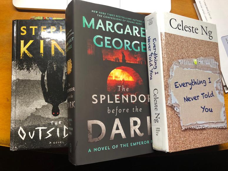 My current reading stack! Photo by D. Monterrey My current reading stack! Photo by D. Monterrey