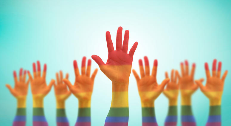 rainbow hands raised