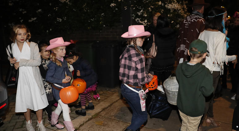 Kids are playing "Trick or Treat" Kids are playing "Trick or Treat"