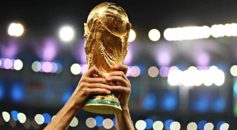 player lifting the FIFA World Cup Trophy player lifting the FIFA World Cup Trophy