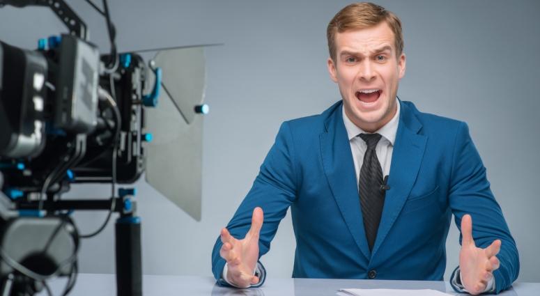 stressed news anchor