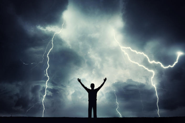 Texano Casi Muere Al Caerle Un Rayo A man silhouette on a storm background. Lord of the lightning. Background on the theme of survival, religion, philosophy, psychology.
