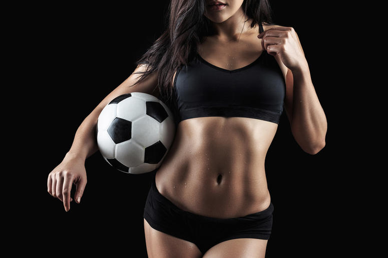 Conoce A La Sexy Modelo Que Podría Ser La Nueva Novia Del Chicharito. Beautiful body of fitness model holding soccer ball. Athlete, bodybuilding.