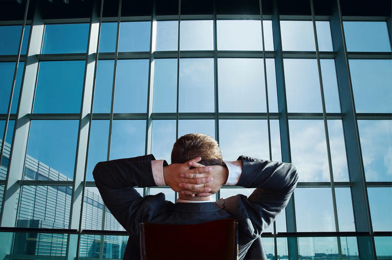 boss or manager looks out the window boss or manager looks out the window