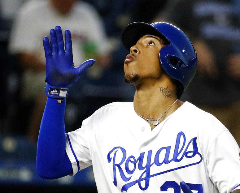 Kansas City Royals' Adalberto Mondesi celebrates as he crosses the plate after hitting a solo home run during the third inning