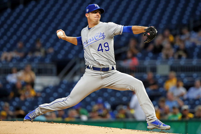Kansas City Royals starting pitcher Heath Fillmyer delivers in the first inning