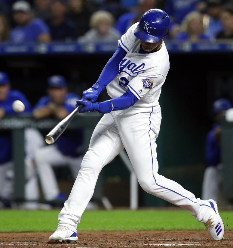 Kansas City Royals' Adalberto Mondesi hits a solo home run off Cleveland Indians starting pitcher Josh Tomlin during the third inning