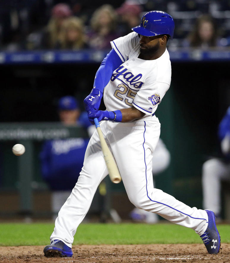 Kansas City Royals' Brian Goodwin hits a grand slam off Cleveland Indians relief pitcher Adam Plutko during the ninth inning