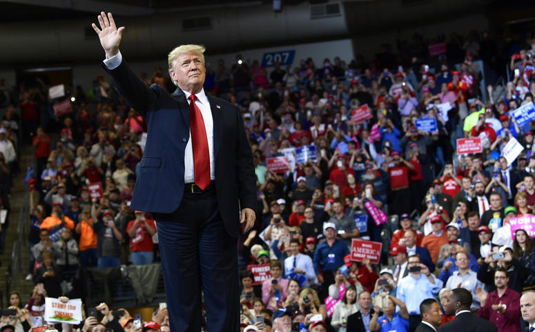 President Donald Trump arrives to speak at a rally in Council Bluffs, Iowa