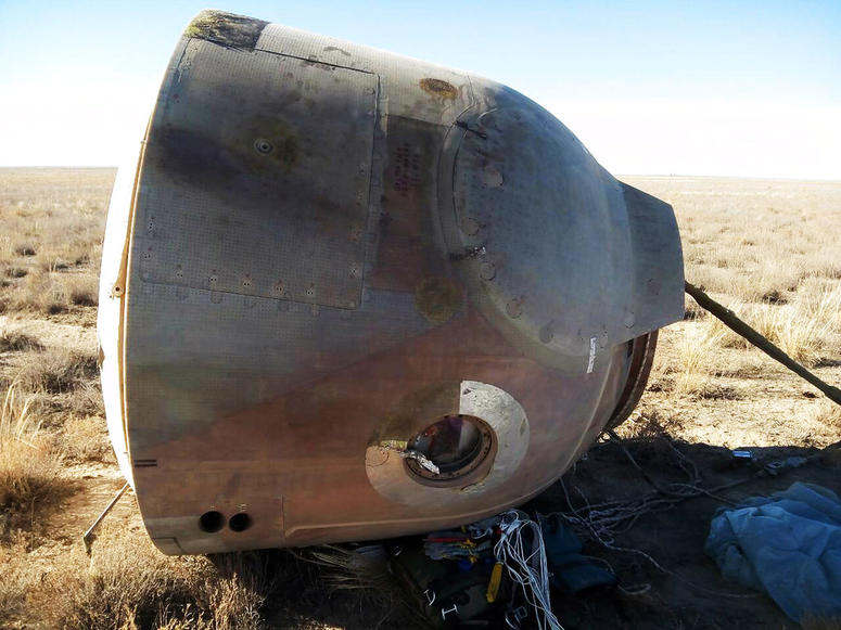 Soyuz MS-10 space capsule lays in a field after an emergency landing near Dzhezkazgan